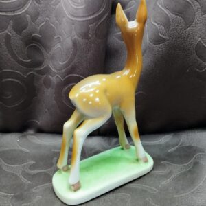 Rear view of the Drasche porcelain fawn showing the delicate painting on its back and ears.